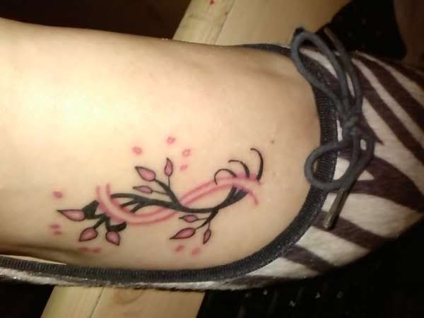 beautiful cherry blossoms tattoo on the foot girls